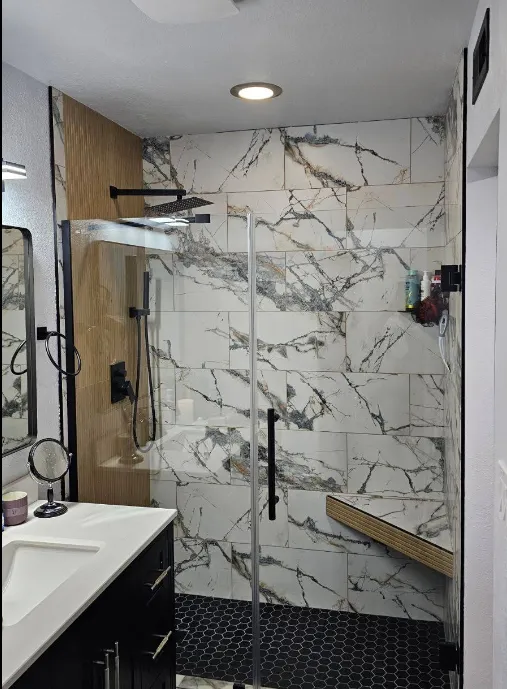 Modern bathroom renovation by remodeling contractors in Fresno CA, showcasing the remodeling process as part of full home remodels and professional remodeling services.